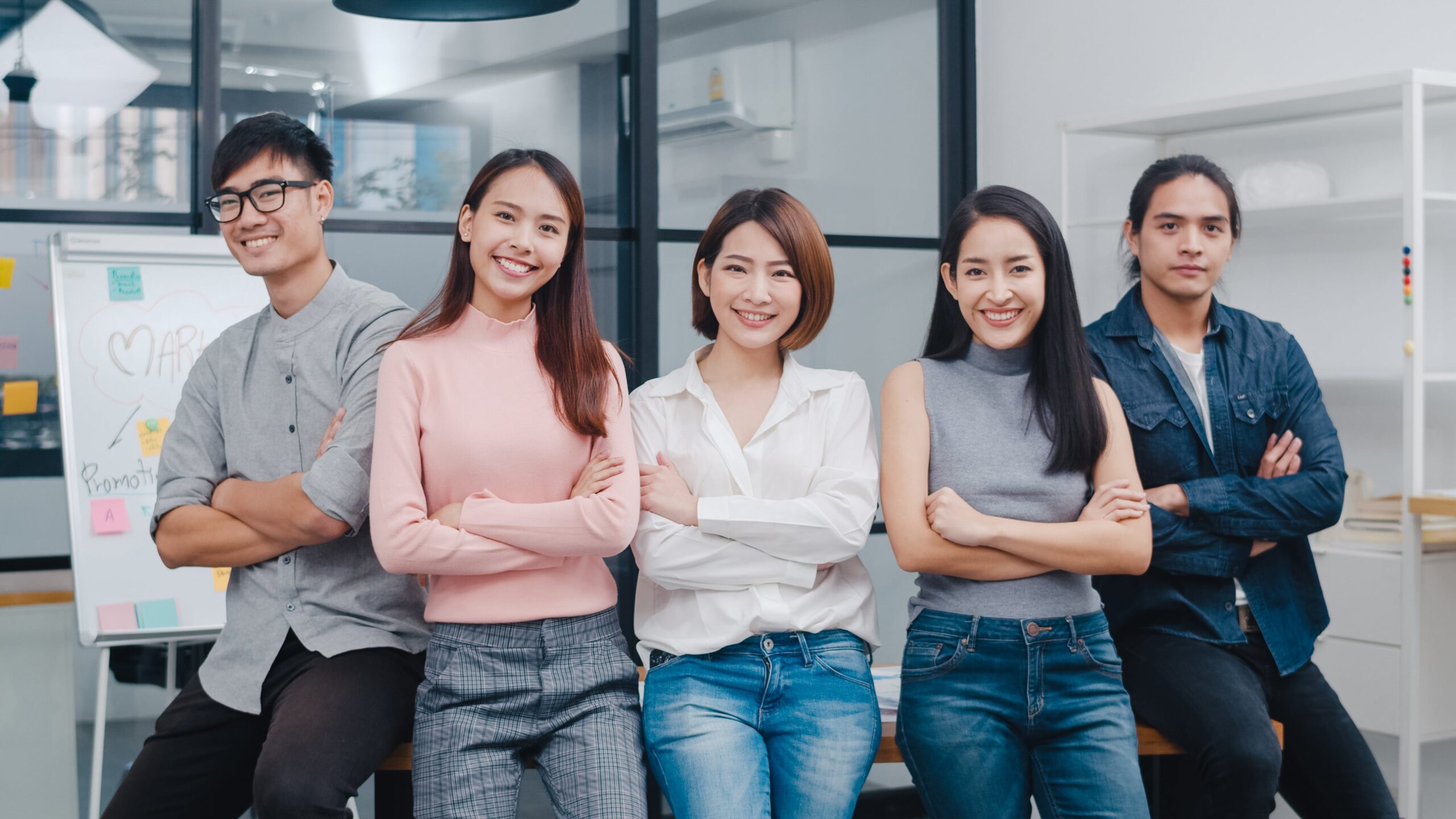 five young people smiling